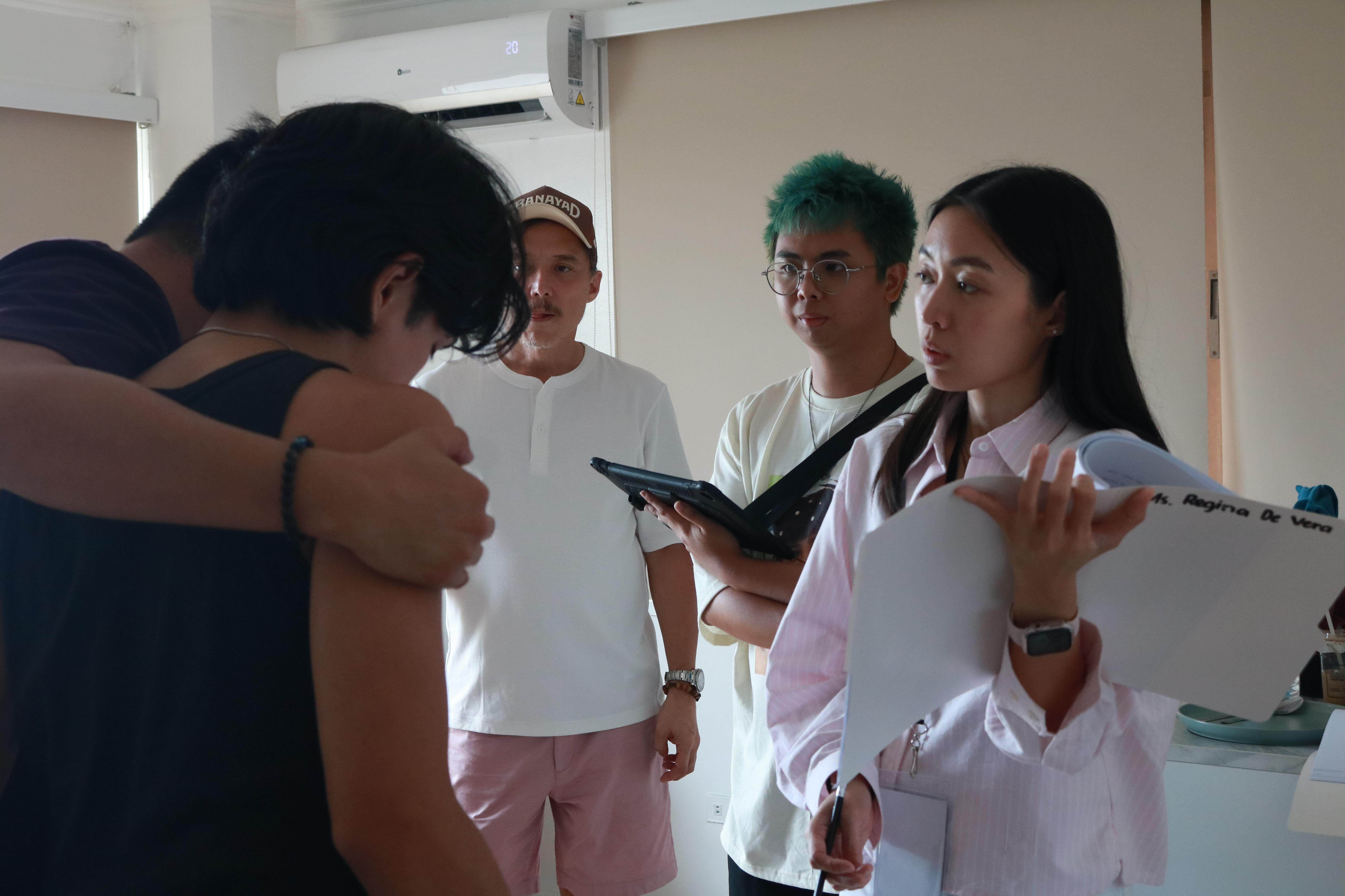 Regina De Vera working as Intimacy Coordinator for "Tayo Lang Ang Nakakaalam" (2026) with actors Epy Quizon, Miguel Odron, director David Corpuz and second assistant director Diokko Dionisio