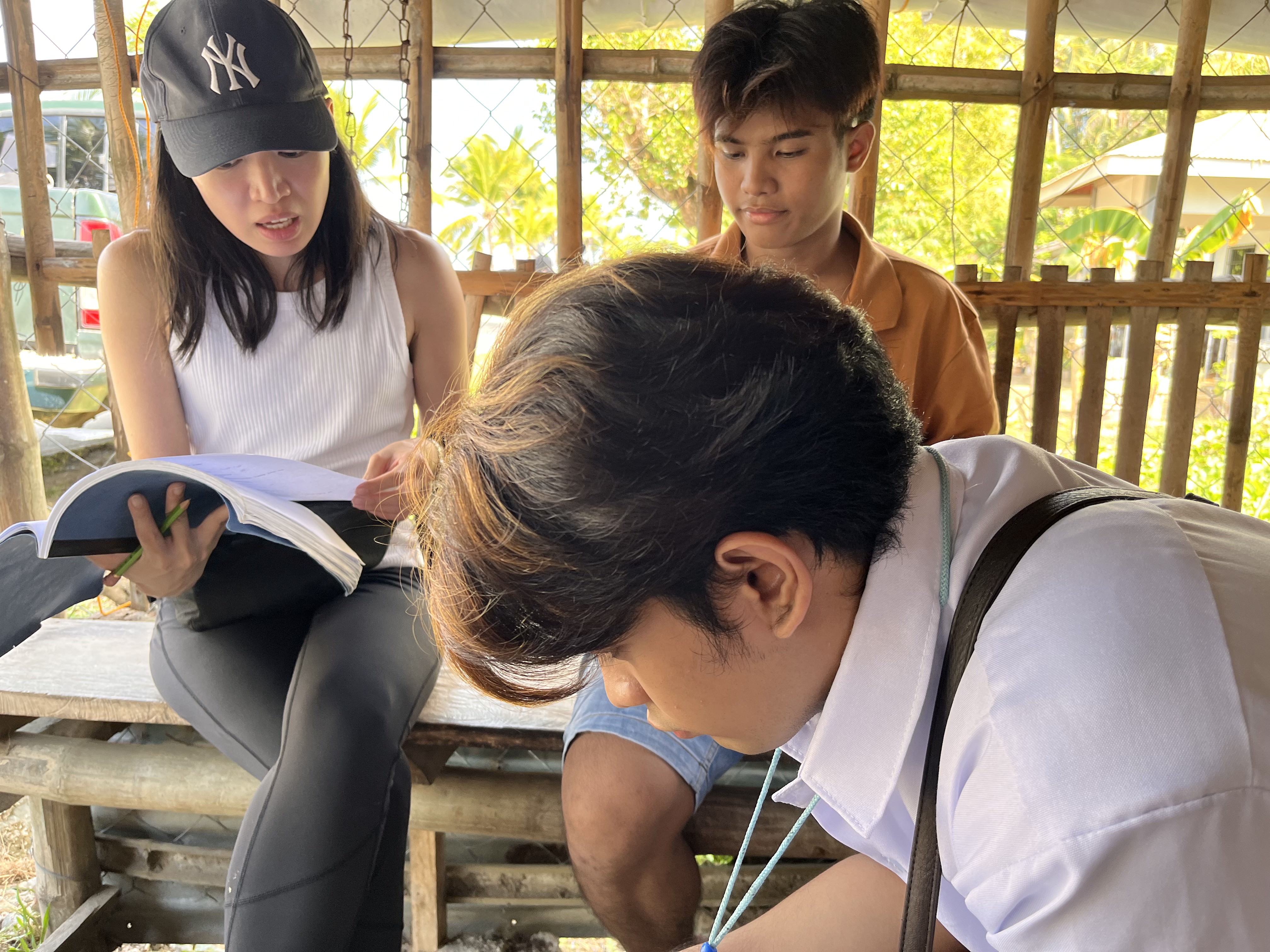 Regina De Vera coaching actors Bon Lentejas and Shun Mark Gomez on-set for Huling Palabas, 2023
