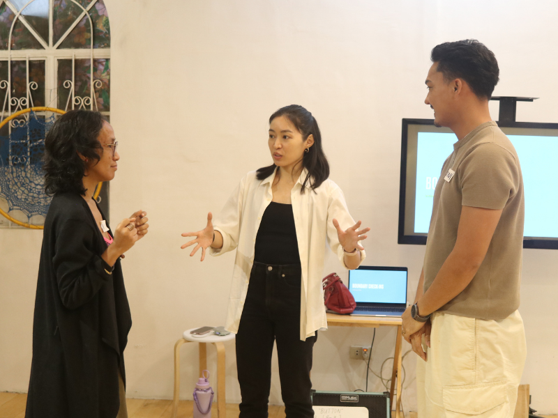 Regina De Vera facilitating a boundary check-in exercise with actors Opaline Santos and Anthony Falcon